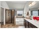 Bathroom with double vanity, soaking tub, glass enclosed shower and tile flooring at 1332 Worcester Trl, Mcdonough, GA 30253