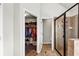 Bathroom with open doorway to walk-in closet and glass enclosed shower at 1332 Worcester Trl, Mcdonough, GA 30253