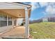 Back patio overlooking green grass at 1332 Worcester Trl, Mcdonough, GA 30253