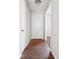 Entryway with neutral walls, a white door, and tile flooring leading to carpeted space at 1360 Cypress Ridge Cir, Stone Mountain, GA 30083