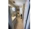 Bathroom with a vanity sink, toilet, patterned shower curtain, neutral tile flooring, and stylish accents at 2742 Snapfinger Manor, Decatur, GA 30035
