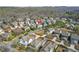 A lovely neighborhood showcasing mature trees and varied home styles from an aerial view at 9893 Colchester St, Douglasville, GA 30135