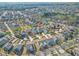 Aerial neighborhood view shows property's location among landscaped yards and tree-lined streets at 9893 Colchester St, Douglasville, GA 30135