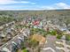 Community aerial view showcases landscaping, homes and proximity to green spaces at 9893 Colchester St, Douglasville, GA 30135
