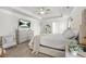 Relax in this spacious main bedroom with TV, ceiling fan, and tray ceilings for a contemporary retreat at 9893 Colchester St, Douglasville, GA 30135