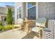 Cozy porch setting with wicker chairs and a small table, perfect for enjoying the outdoors at 9893 Colchester St, Douglasville, GA 30135