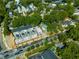 Aerial view of neighborhood, showcasing lush greenery, and the city street with cars traveling on the road at 175 Moreland Se Ave, Atlanta, GA 30316