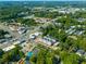 Wide aerial view of neighborhood, showcasing lush greenery and commercial areas at 175 Moreland Se Ave, Atlanta, GA 30316