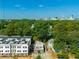 Scenic aerial view of neighborhood, showcasing lush greenery, and the city skyline in the distance at 175 Moreland Se Ave, Atlanta, GA 30316