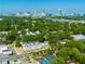 Scenic aerial view of neighborhood, showcasing lush greenery, and the city skyline in the distance at 175 Moreland Se Ave, Atlanta, GA 30316