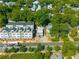 Aerial view of neighborhood, showcasing lush greenery, and the city street with cars traveling on the road at 175 Moreland Se Ave, Atlanta, GA 30316