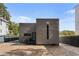 Modern home with a gray exterior, sleek design, and private outdoor space at 175 Moreland Se Ave, Atlanta, GA 30316