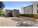 Modern home with a sleek gray exterior, gravel groundcover, and a fenced yard at 175 Moreland Se Ave, Atlanta, GA 30316