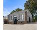 Contemporary home featuring gray siding, stone accents, and black framed windows at 175 Moreland Se Ave, Atlanta, GA 30316