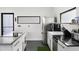 Kitchen featuring stainless steel appliances, white cabinets, and stylish countertops at 175 Moreland Se Ave, Atlanta, GA 30316