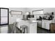 Bright kitchen with stainless steel appliances, a center island, and ample countertop space at 175 Moreland Se Ave, Atlanta, GA 30316