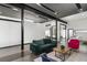 Open concept living space with modern furniture and kitchen view at 175 Moreland Se Ave, Atlanta, GA 30316