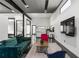 Open concept living space with modern furniture and kitchen view at 175 Moreland Se Ave, Atlanta, GA 30316