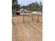 Spacious wooden deck overlooking tennis court and play area at 203 Sea Marsh Ct, Fayetteville, GA 30215