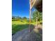 Backyard featuring a scenic view of a serene lake surrounded by lush greenery, perfect for relaxation at 203 Sea Marsh Ct, Fayetteville, GA 30215