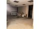 Unfinished basement featuring a drop ceiling, concrete floor, and partial framing at 203 Sea Marsh Ct, Fayetteville, GA 30215