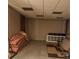 Unfinished basement featuring a drop ceiling, some framing, and utilities for future development at 203 Sea Marsh Ct, Fayetteville, GA 30215