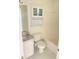 Clean bathroom with a shower/tub combo, granite counters, and a white vanity at 203 Sea Marsh Ct, Fayetteville, GA 30215