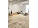Spacious two-car garage with painted walls and high ceilings at 203 Sea Marsh Ct, Fayetteville, GA 30215