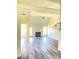 Bright living room featuring vaulted ceilings, fireplace and neutral paint scheme at 203 Sea Marsh Ct, Fayetteville, GA 30215