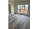 Spacious main bedroom with natural light and attached bathroom at 203 Sea Marsh Ct, Fayetteville, GA 30215
