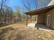 Relaxing covered back porch is perfect for enjoying the private, wooded backyard at 333 Darlington Dr, Ellenwood, GA 30294