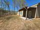 Enjoy the outdoor with this covered patio and a view of trees at 333 Darlington Dr, Ellenwood, GA 30294
