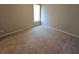 This bedroom has neutral colored walls and carpet at 333 Darlington Dr, Ellenwood, GA 30294
