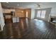 Bright open concept featuring a kitchen island, fireplace, stainless appliances and plenty of natural light at 333 Darlington Dr, Ellenwood, GA 30294