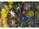 Aerial view of homes in a cul-de-sac featuring lush landscaping and tree coverage at 425 Prestwick Ct, Alpharetta, GA 30005