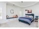 Cozy bedroom with a built-in bench, a bed adorned with toys, and natural lighting at 425 Prestwick Ct, Alpharetta, GA 30005