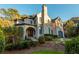 Stunning home with brick exterior, lush landscaping and three-car garage at 425 Prestwick Ct, Alpharetta, GA 30005
