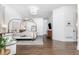 Large main bedroom features a canopy bed, hardwood floors, TV, and ensuite bathroom access at 425 Prestwick Ct, Alpharetta, GA 30005