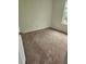 Bedroom featuring a window, neutral carpet and white walls at 10303 Waldrop Place, Decatur, GA 30034