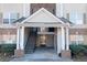 Apartment complex entrance featuring a covered stairwell and access to the units above at 10303 Waldrop Place, Decatur, GA 30034