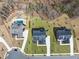 Aerial view of homes with private pools and landscaped yards at 13415 Bishops Ct, Roswell, GA 30075