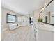 Elegant bathroom with a freestanding tub, walk-in shower, and bright natural light at 13415 Bishops Ct, Roswell, GA 30075