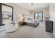 Bright bedroom with comfortable seating, offering peaceful views and a calming retreat at 13415 Bishops Ct, Roswell, GA 30075