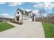 Beautiful home with large driveway and three-car garage at 13415 Bishops Ct, Roswell, GA 30075