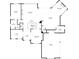 First floor plan featuring a foyer, dining room, kitchen, living room, garage, and bedrooms at 13415 Bishops Ct, Roswell, GA 30075