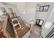 Elegant foyer with chandelier lighting and stairs at 13415 Bishops Ct, Roswell, GA 30075
