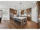 Gourmet kitchen with large island, pendant lights, and stainless steel appliances at 13415 Bishops Ct, Roswell, GA 30075