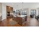 Gourmet kitchen features a central island with a farmhouse sink at 13415 Bishops Ct, Roswell, GA 30075