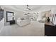 Spacious main bedroom featuring a tray ceiling, fireplace, and luxurious finishes at 13415 Bishops Ct, Roswell, GA 30075