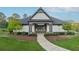 Community swim club featuring a stylish building, landscaping, and convenient parking at 13415 Bishops Ct, Roswell, GA 30075